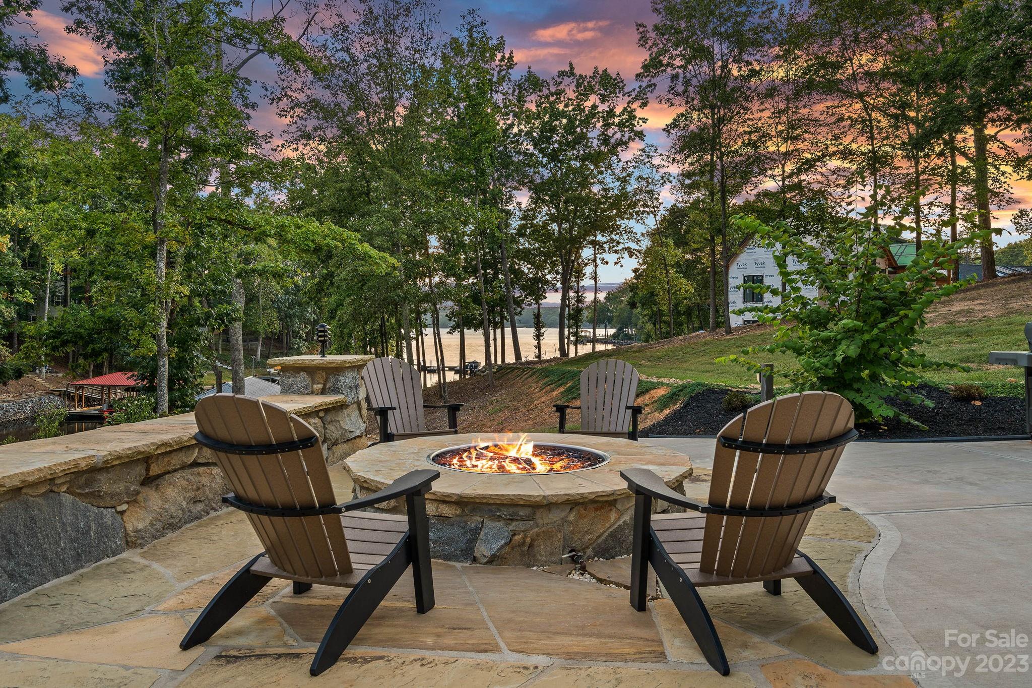 222 Greenbay Road Mooresville, NC 28117 - Photo 40 of 44 a backyard of a house with table and chairs