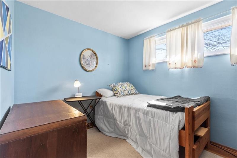 13733 Ormsby Drive Irwin, PA 15642 - Photo 15 of 24 a bedroom with a bed and a window
