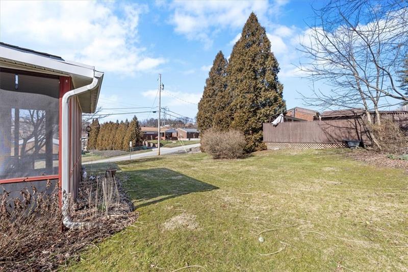 13733 Ormsby Drive Irwin, PA 15642 - Photo 21 of 24 a view of a yard in front of a house