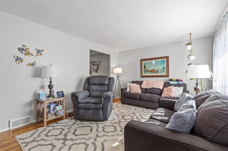 13733 Ormsby Drive Irwin, PA 15642 - Photo 3 of 24 a living room with furniture and a window