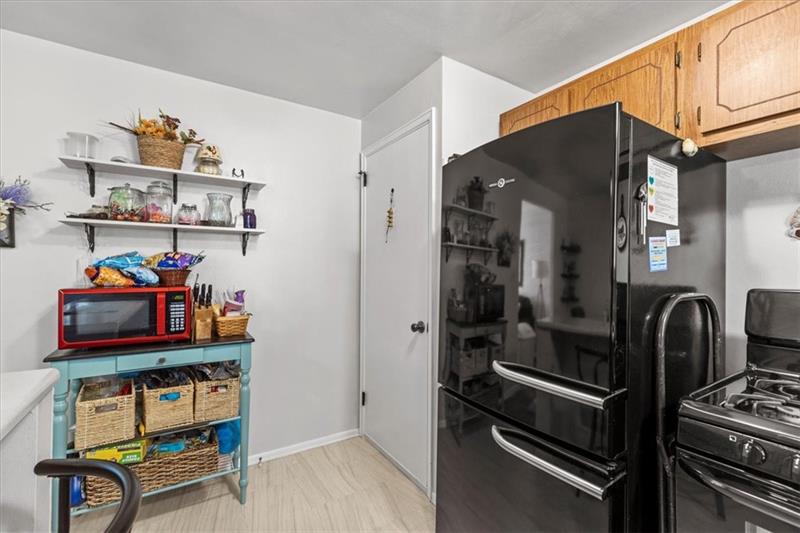 13733 Ormsby Drive Irwin, PA 15642 - Photo 9 of 24 a room with furniture and wooden floor