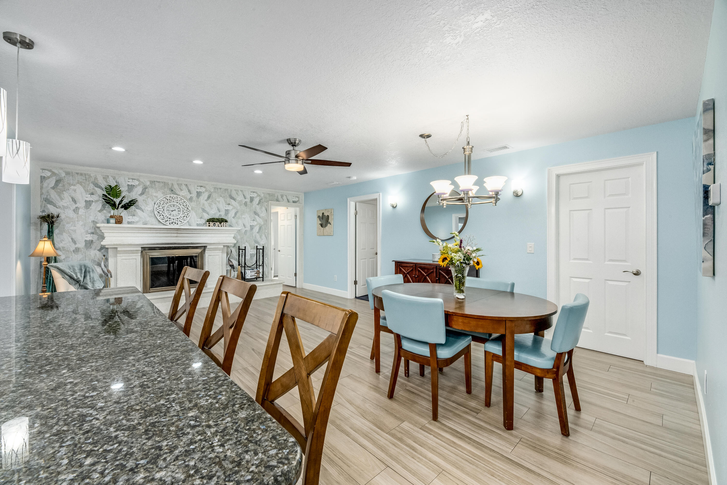 415 Wayne Avenue Indialantic, FL 32903 - Photo 16 of 63 a view of a dining room with furniture and wooden floor