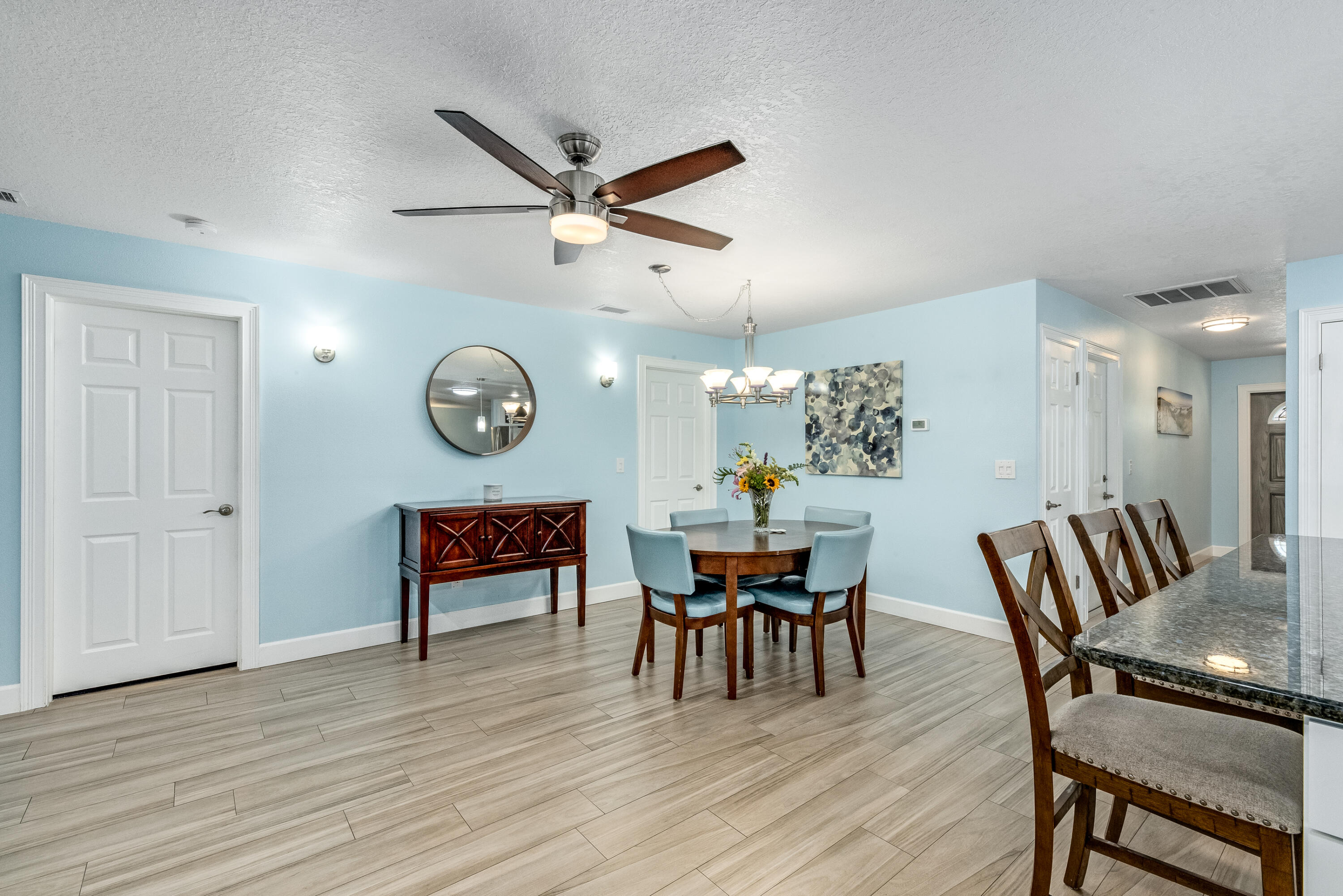 415 Wayne Avenue Indialantic, FL 32903 - Photo 17 of 63 a view of a dining room with furniture and a large window