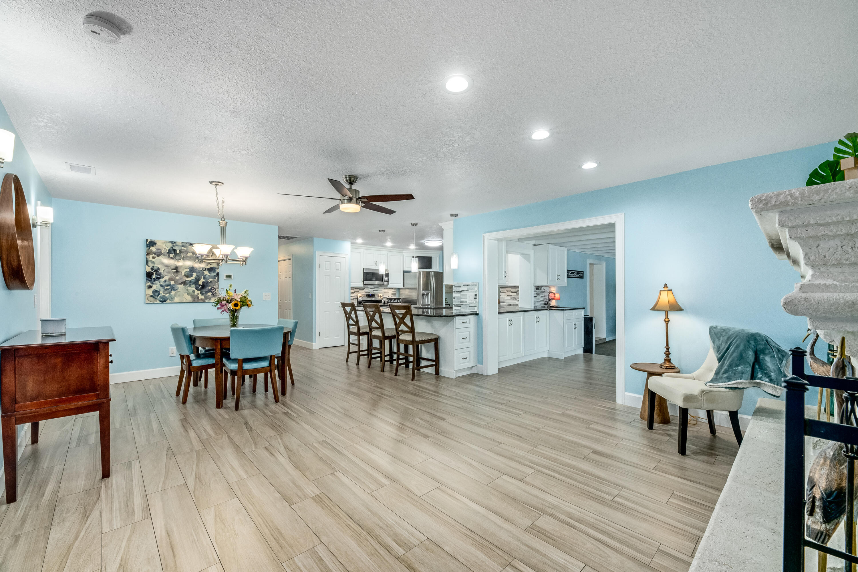 415 Wayne Avenue Indialantic, FL 32903 - Photo 21 of 63 a view of a dining room with furniture and wooden floor