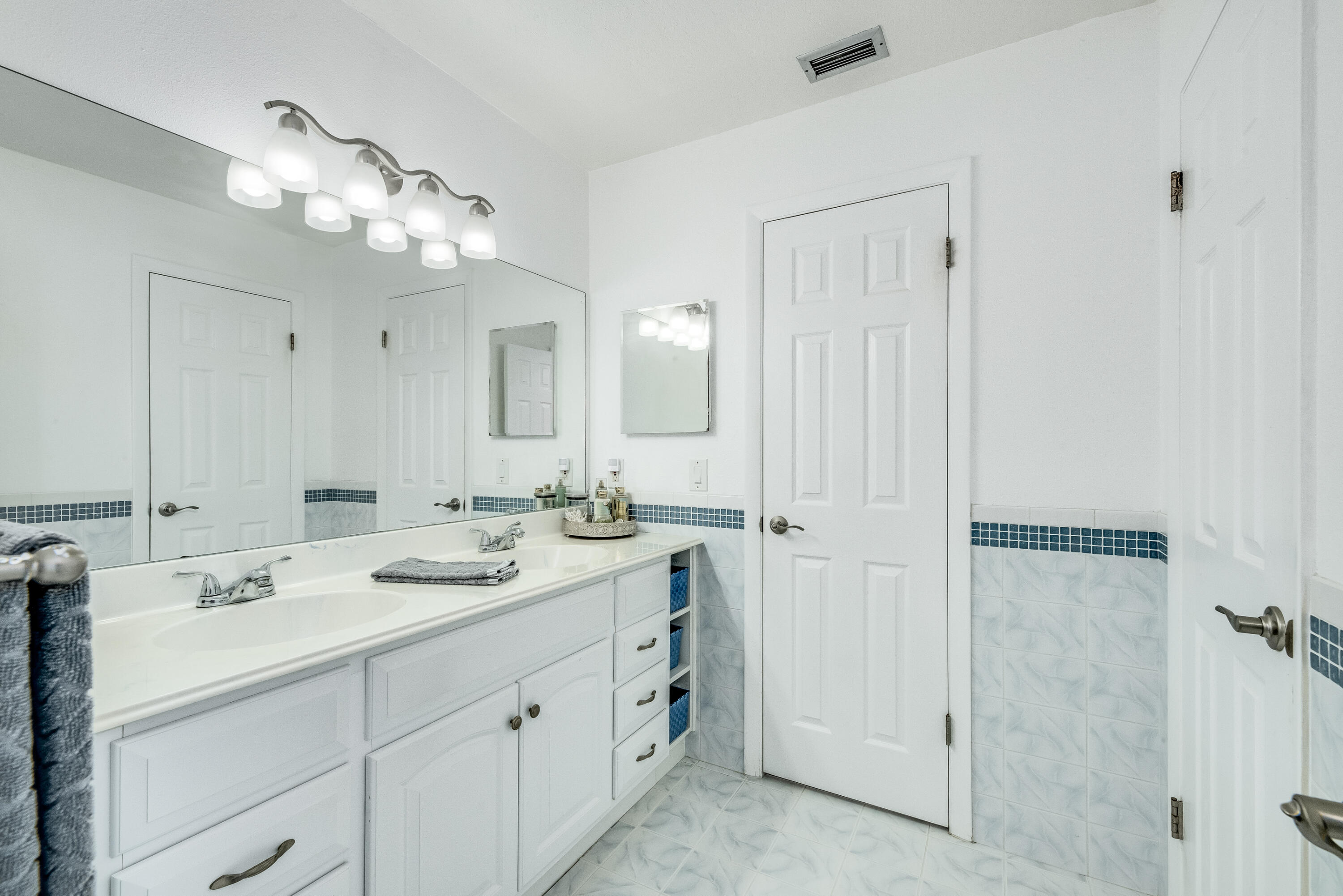 415 Wayne Avenue Indialantic, FL 32903 - Photo 30 of 63 a spacious bathroom with a double vanity sink mirror and