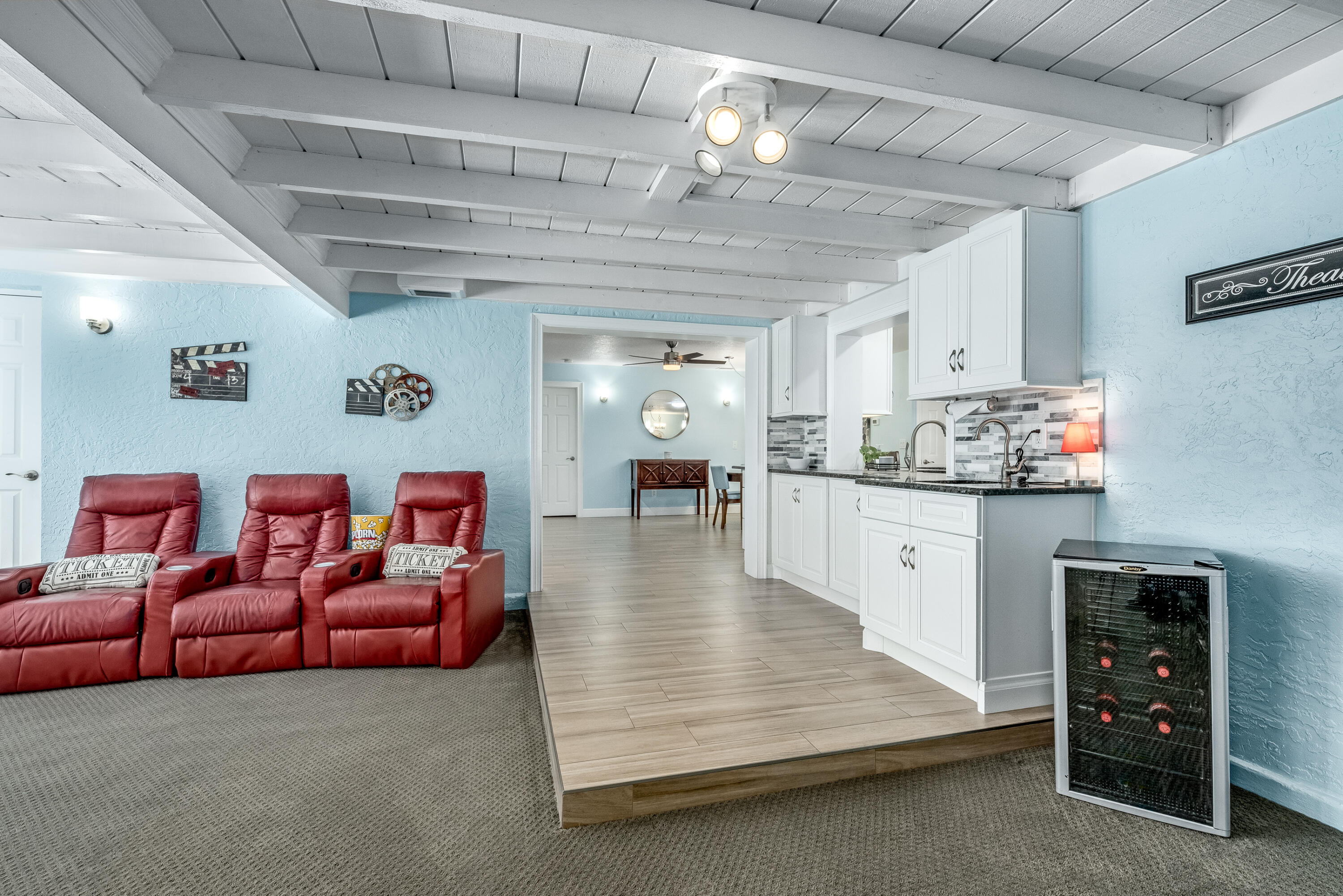 415 Wayne Avenue Indialantic, FL 32903 - Photo 33 of 63 a living room with furniture and a chandelier