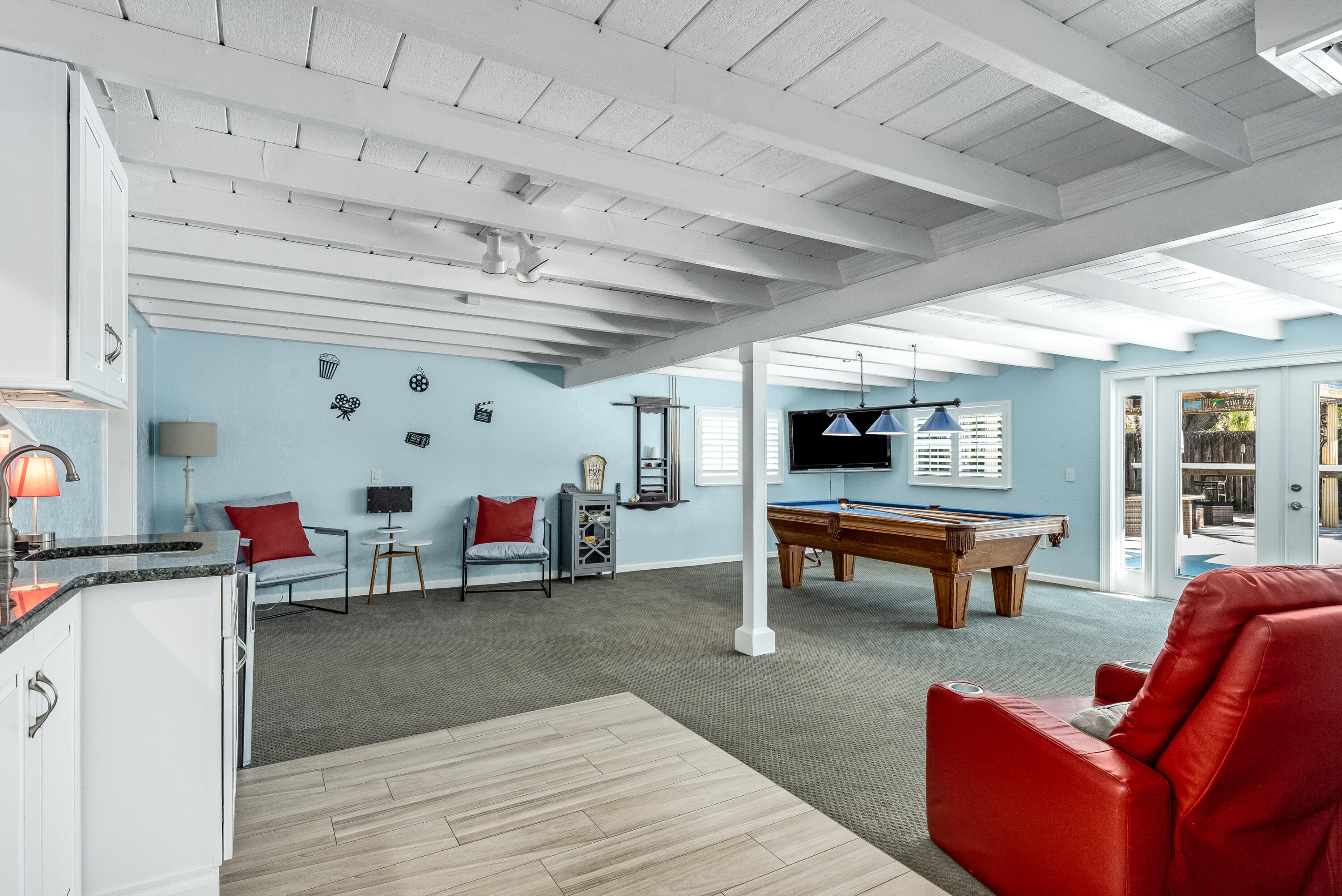 415 Wayne Avenue Indialantic, FL 32903 - Photo 35 of 63 a living room with furniture and a wooden floor