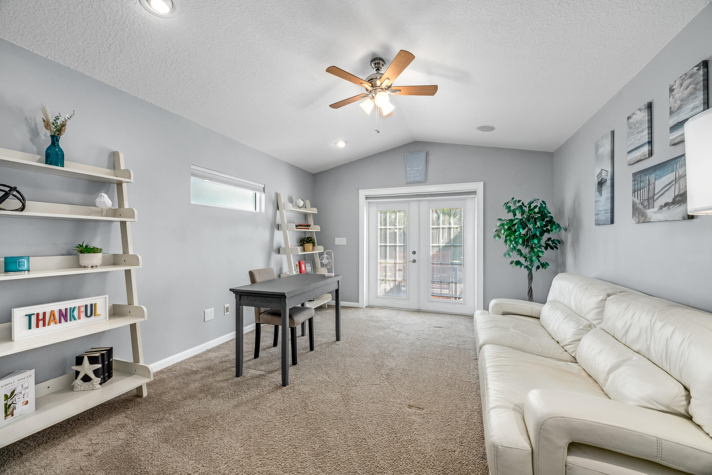 415 Wayne Avenue Indialantic, FL 32903 - Photo 45 of 63 a living room with furniture and decor