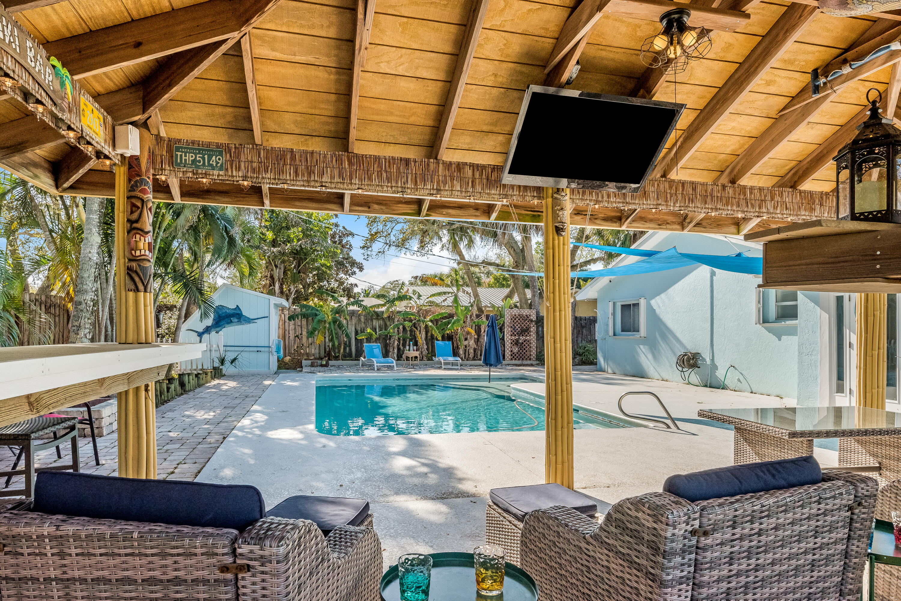 415 Wayne Avenue Indialantic, FL 32903 - Photo 53 of 63 a building outdoor space with patio furniture and potted plants