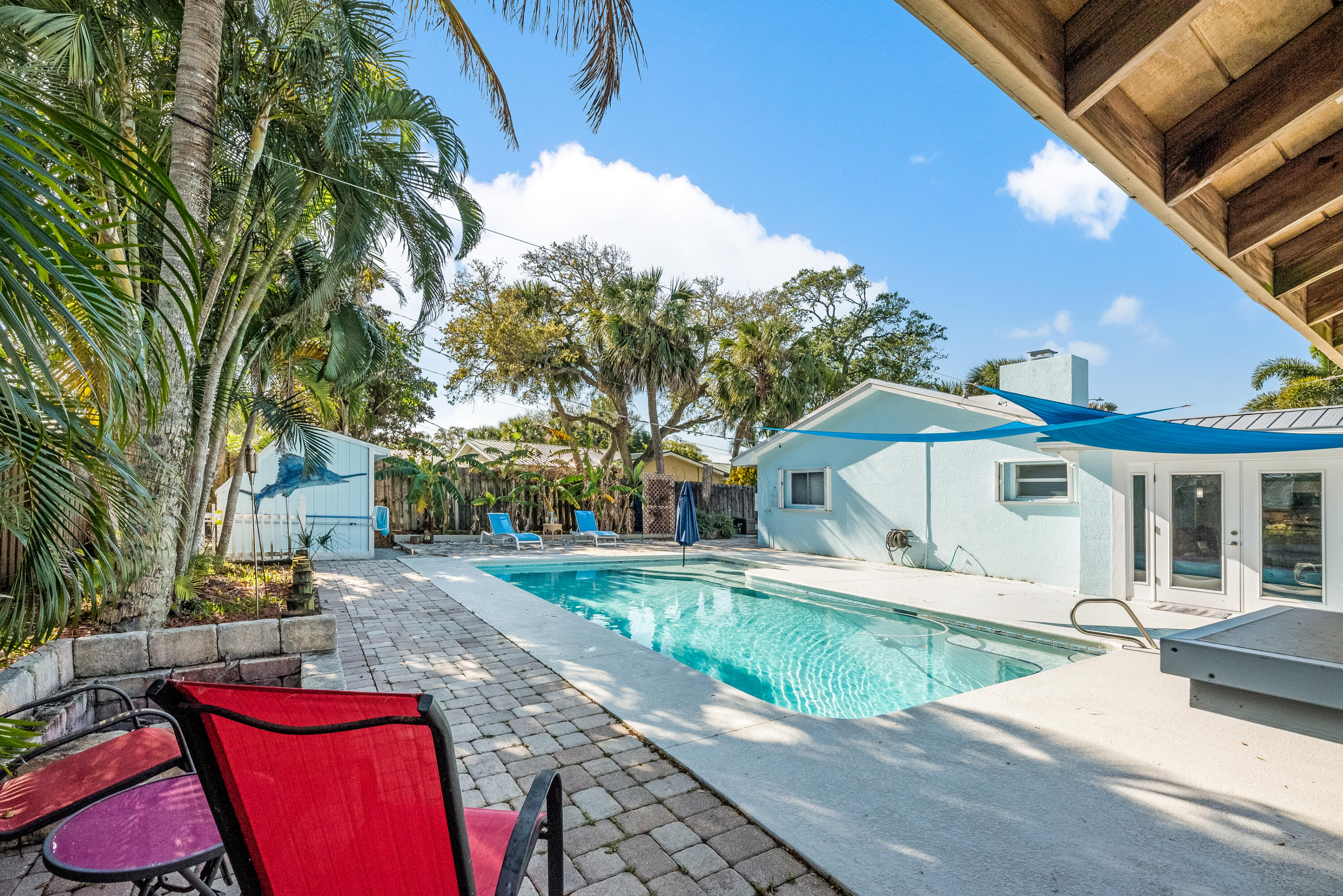 415 Wayne Avenue Indialantic, FL 32903 - Photo 55 of 63 a view of a house with a yard
