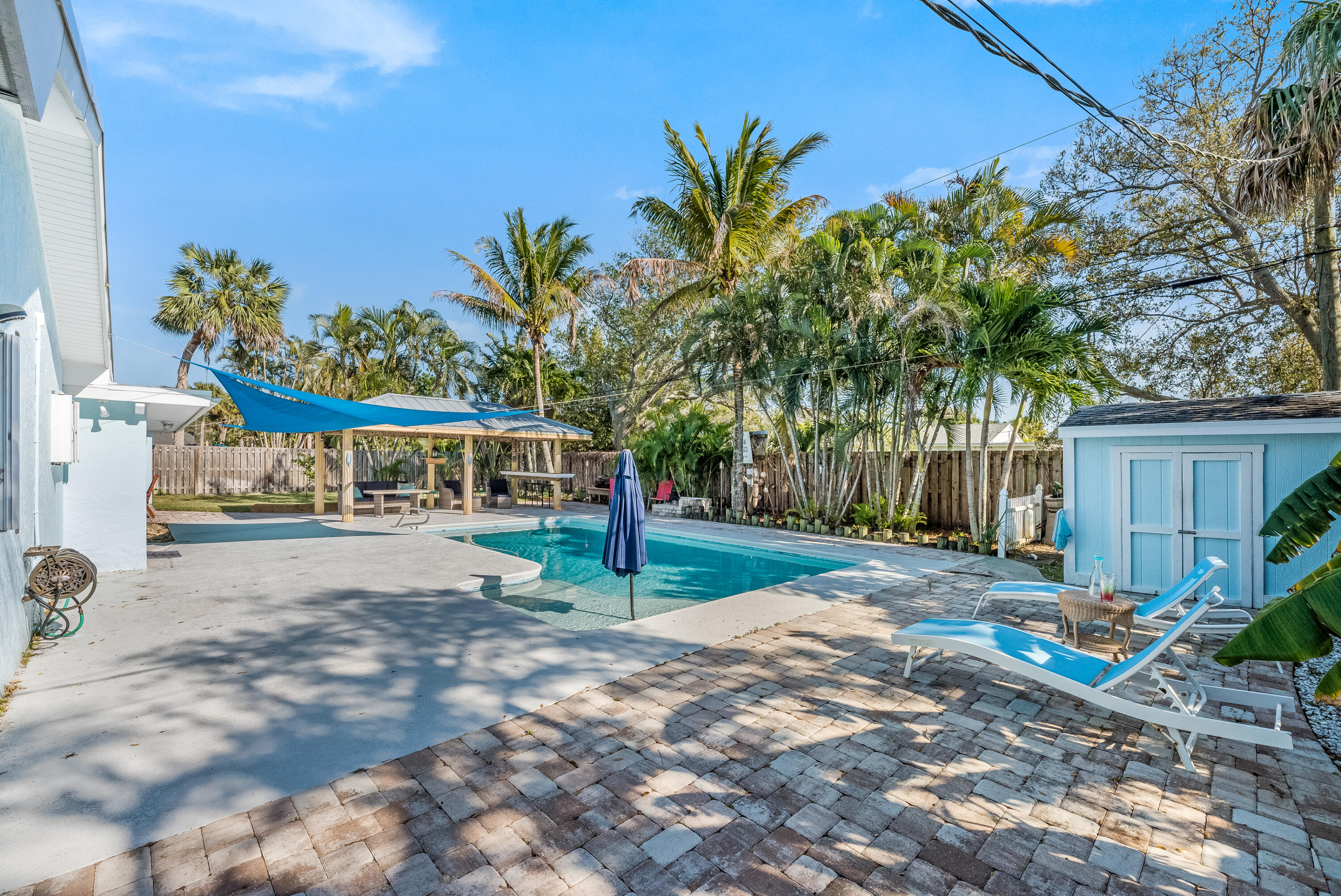 415 Wayne Avenue Indialantic, FL 32903 - Photo 57 of 63 a view of a house with backyard and sitting area