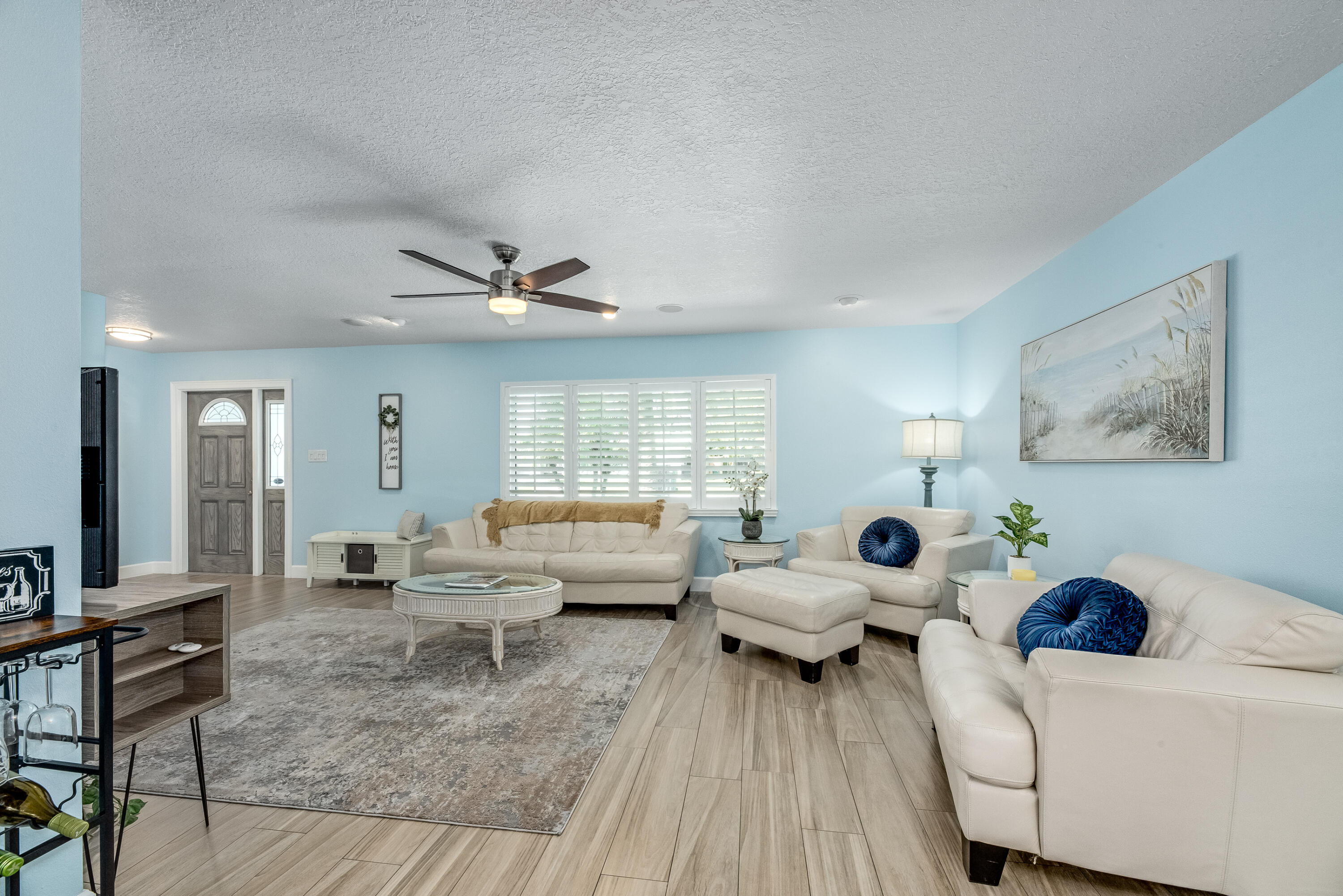 415 Wayne Avenue Indialantic, FL 32903 - Photo 6 of 63 a living room with furniture and wooden floor