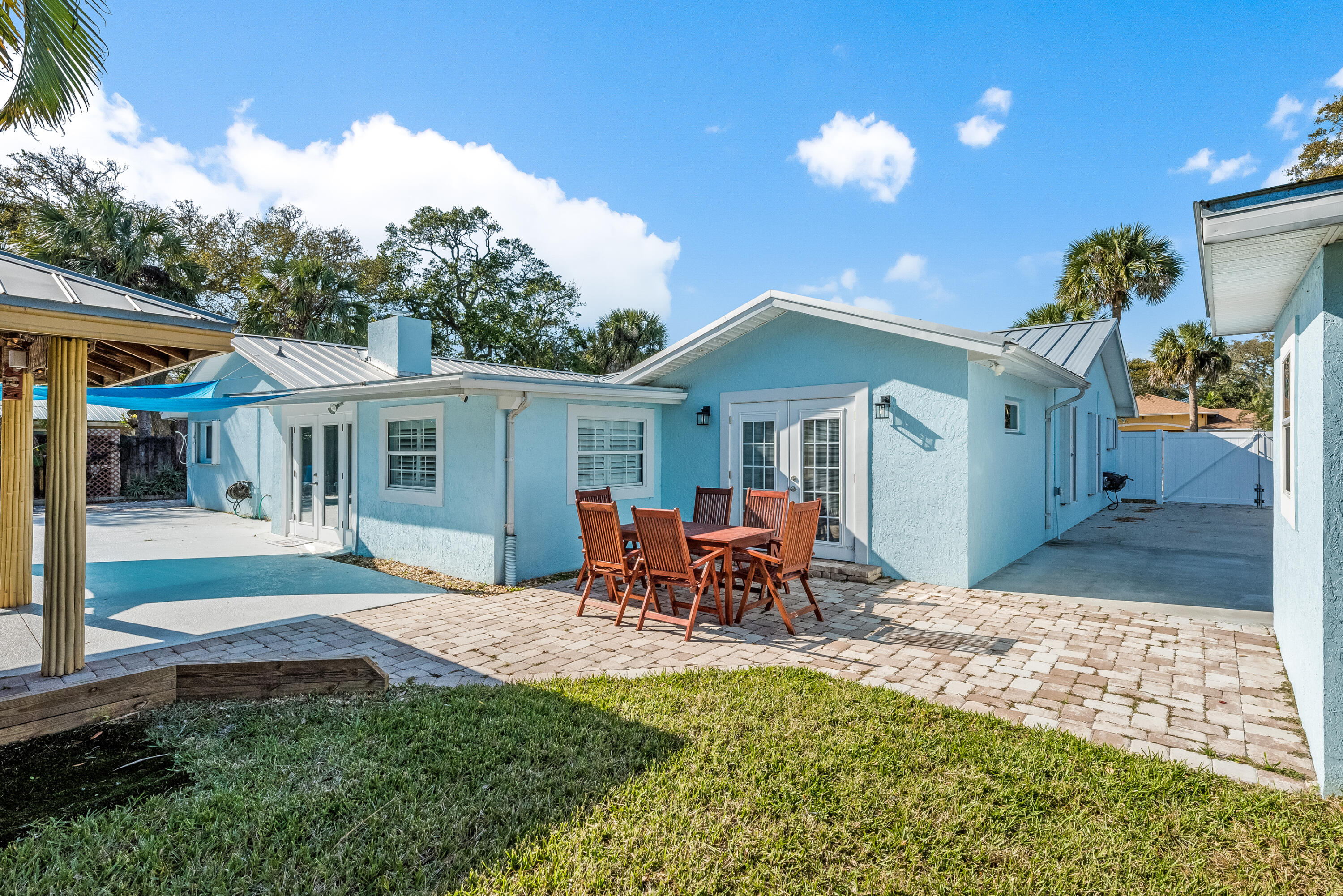 415 Wayne Avenue Indialantic, FL 32903 - Photo 61 of 63 a view of a house with backyard and sitting area