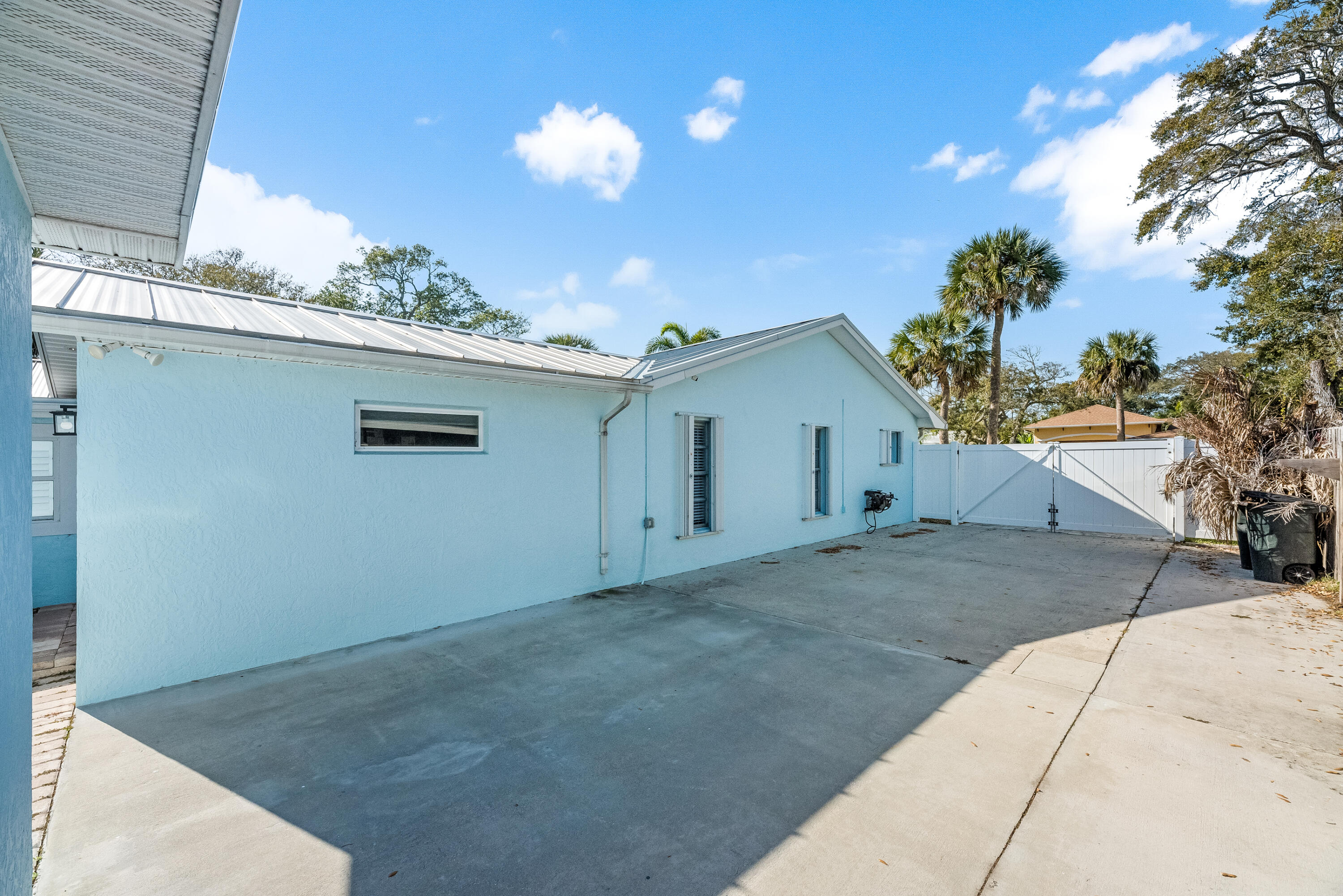 415 Wayne Avenue Indialantic, FL 32903 - Photo 63 of 63 a view of a house with a patio