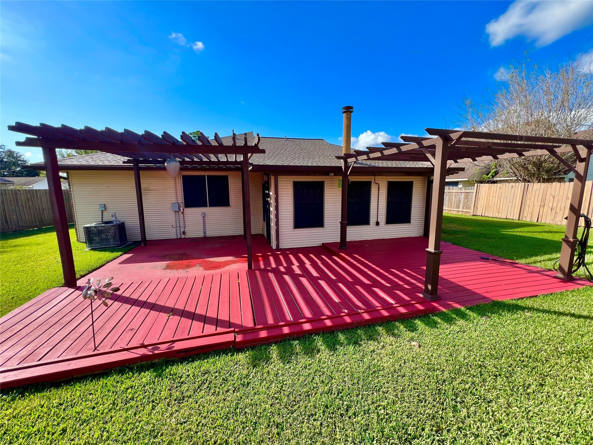 104 Trail Ride Road Angleton, TX 77515 - Photo 19 of 26 a view of a backyard with swimming pool