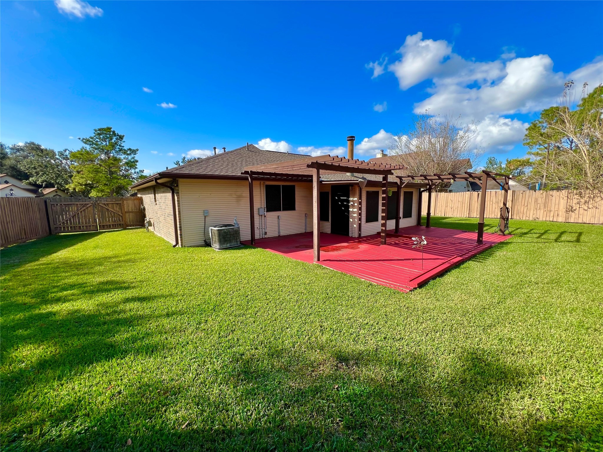 104 Trail Ride Road Angleton, TX 77515 - Photo 23 of 26 a view of a house with pool and chairs