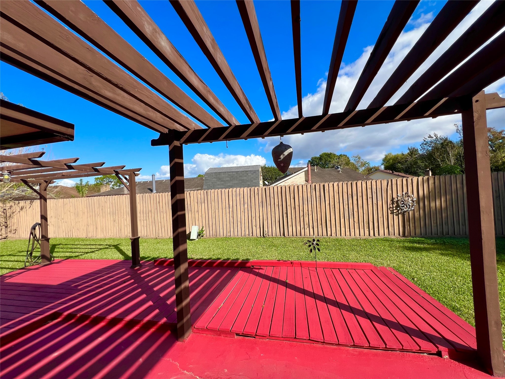 104 Trail Ride Road Angleton, TX 77515 - Photo 25 of 26 a view of yard with porch and wooden fence