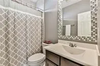 a bathroom with a sink and toilet