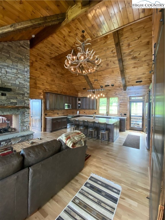 543 Broken Arrow Trail Boone, NC 28607 - Photo 14 of 35 a living room with furniture and a fireplace