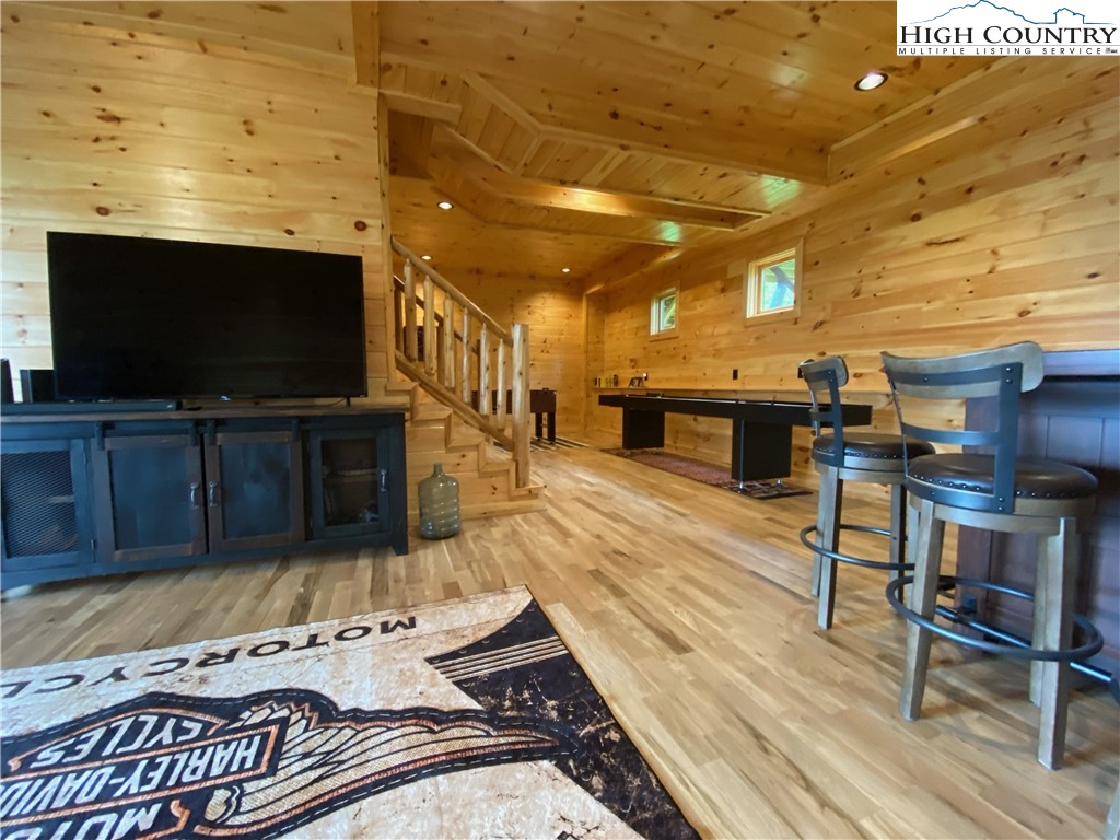543 Broken Arrow Trail Boone, NC 28607 - Photo 34 of 35 a living room with furniture and a flat screen tv