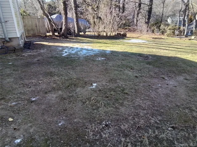 a view of a swimming pool with an outdoor space and seating area