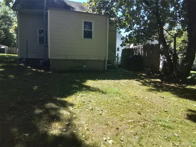 a view of backyard of house