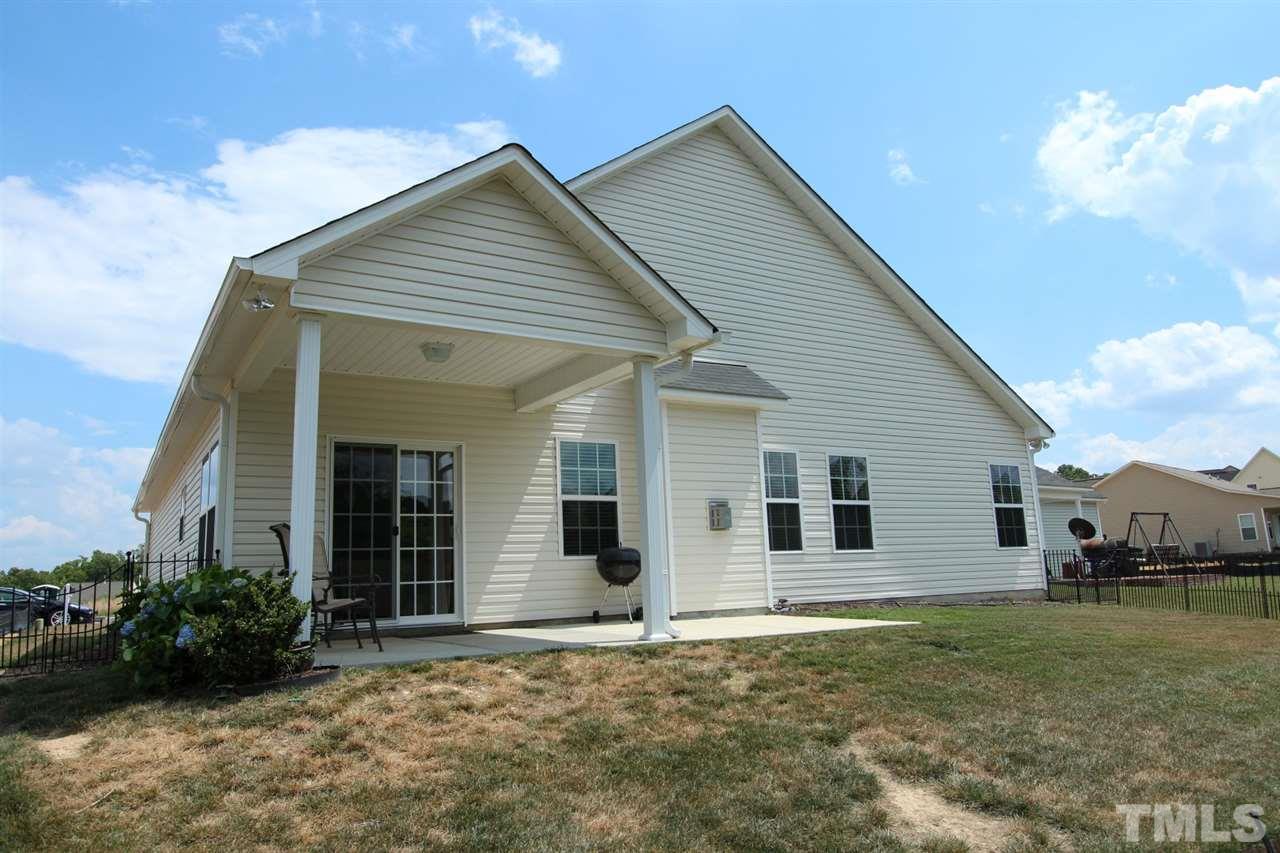 6312 Slopeside Court Raleigh, NC 27610 - Photo 20 of 22 a view of a house with backyard