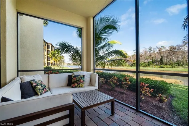 a view of a living room and a window
