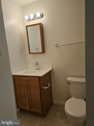a bathroom with a bathtub and a toilet