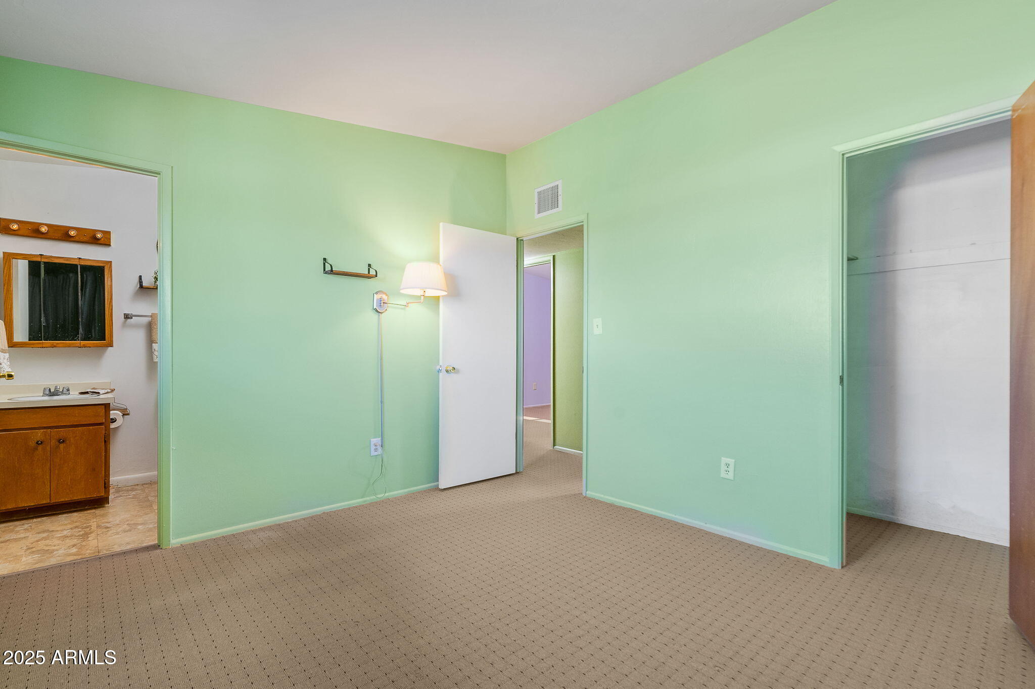 417 West Sunset Drive Mammoth, AZ 85618 - Photo 21 of 35 a view of an empty room with a kitchen