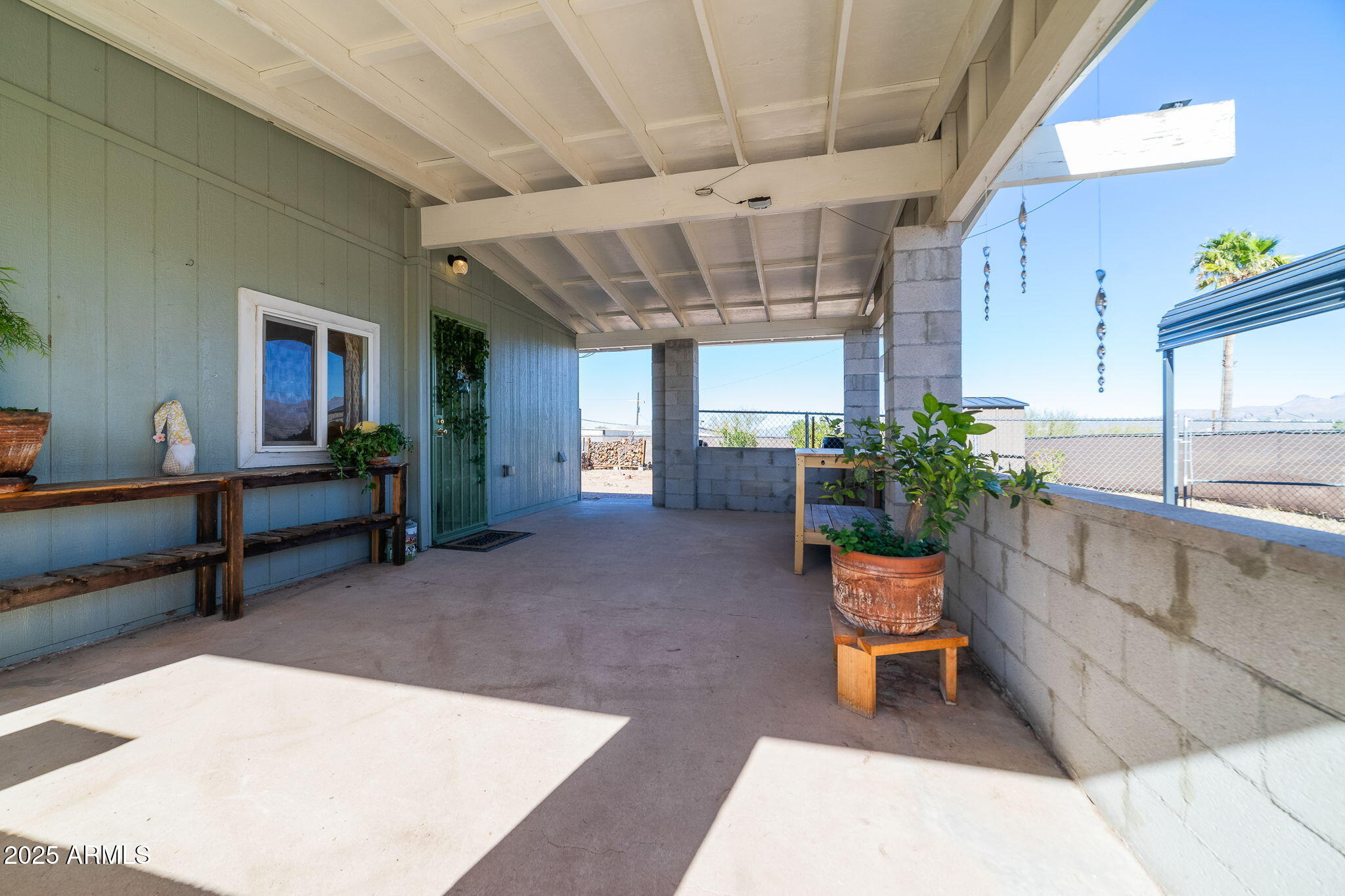 417 West Sunset Drive Mammoth, AZ 85618 - Photo 28 of 35 a living room with furniture and potted plants