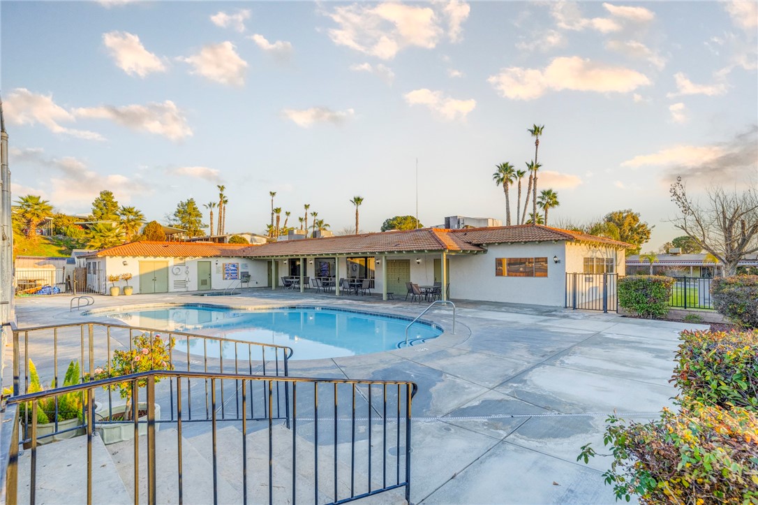 8536 Kern Canyon Road, Unit 184 Bakersfield, CA 93306 - Photo 25 of 28 a view of a swimming pool with seating space