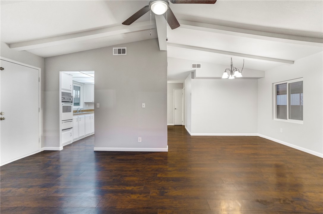 8536 Kern Canyon Road, Unit 184 Bakersfield, CA 93306 - Photo 5 of 28 a view of empty room with wooden floor