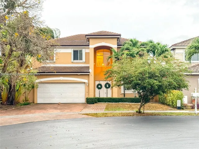 a view of a house with a swimming pool
