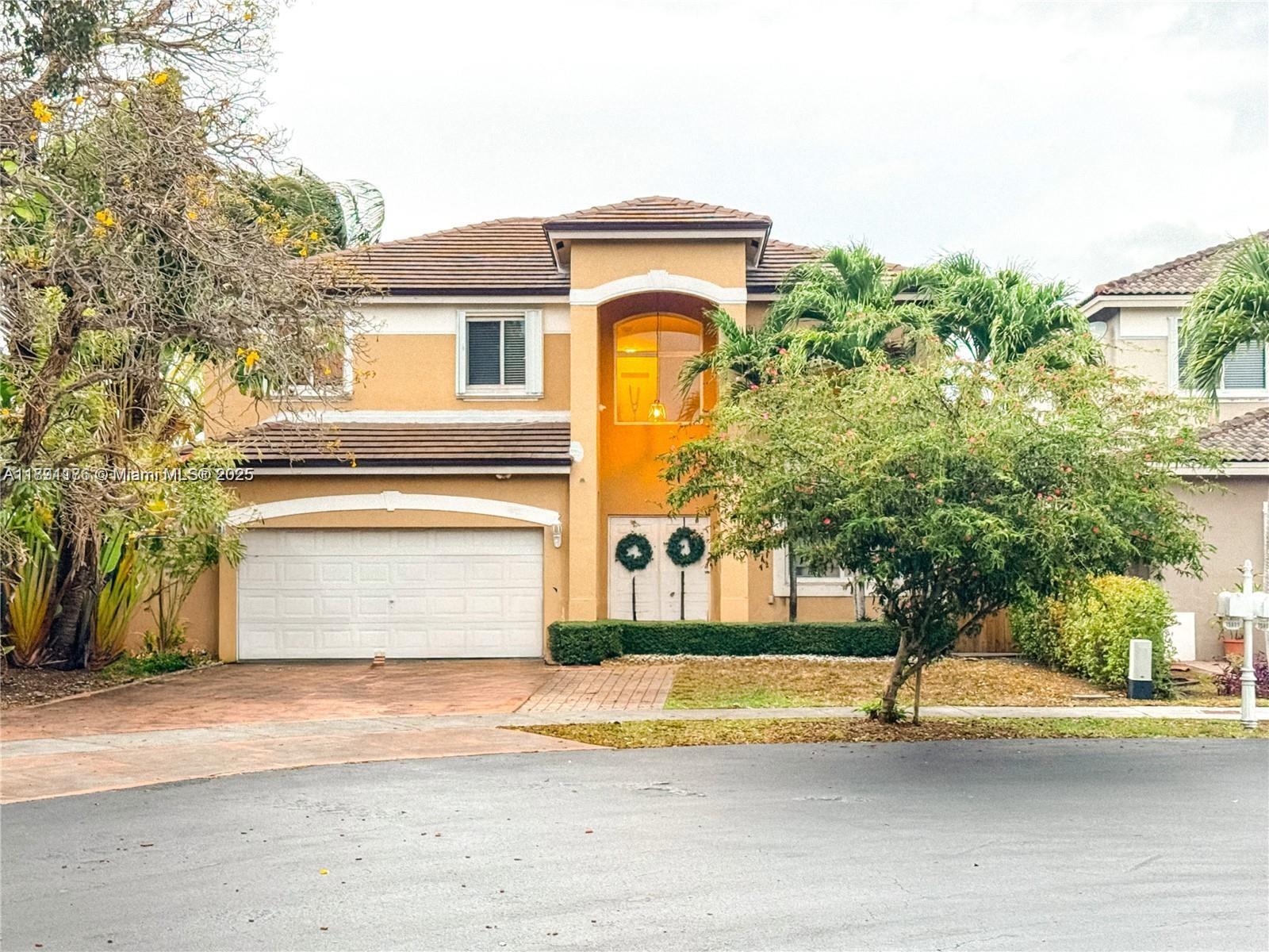 a view of a house with a swimming pool