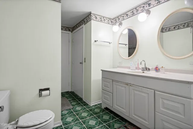 a bathroom with a shower and a sink