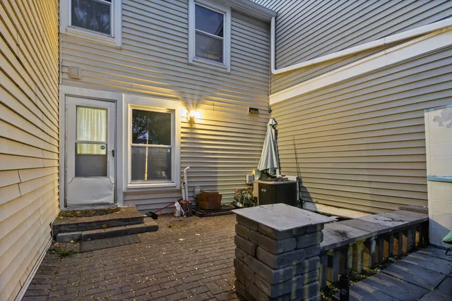 a backyard of a house with seating space