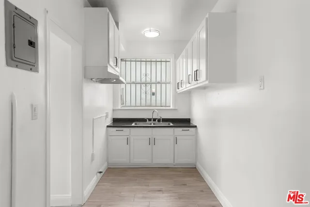 a view of an empty walk in closet