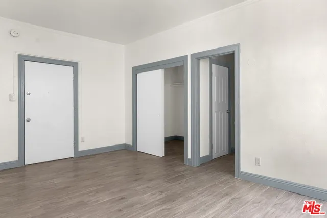 a view of a room that has a mirror in it