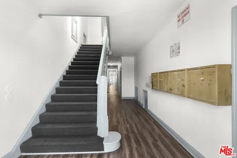 a view of entryway with wooden floor