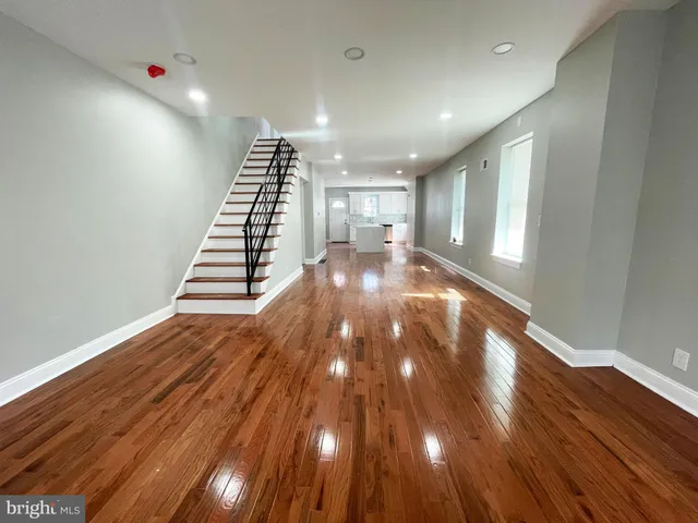a view of entryway with wooden floor