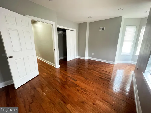a view of entryway with wooden floor