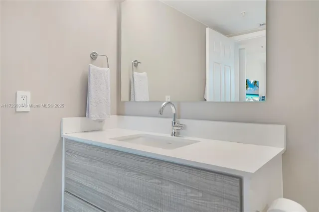 a view of a lake with furniture