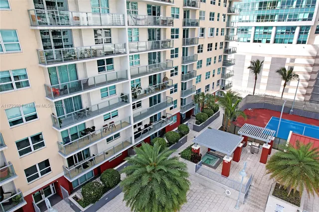 a view of a building with a street