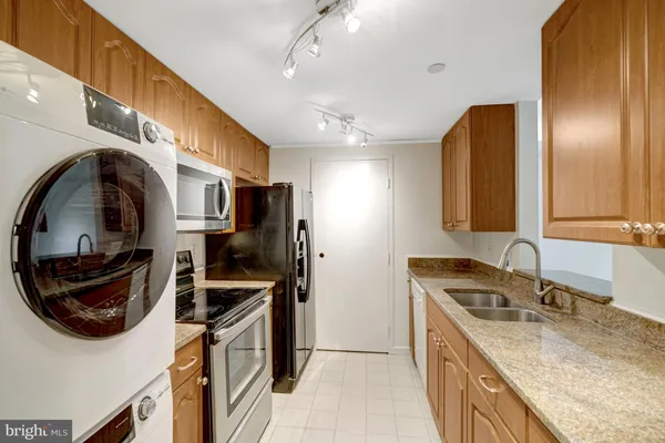 a view of a chairs and table in a patio