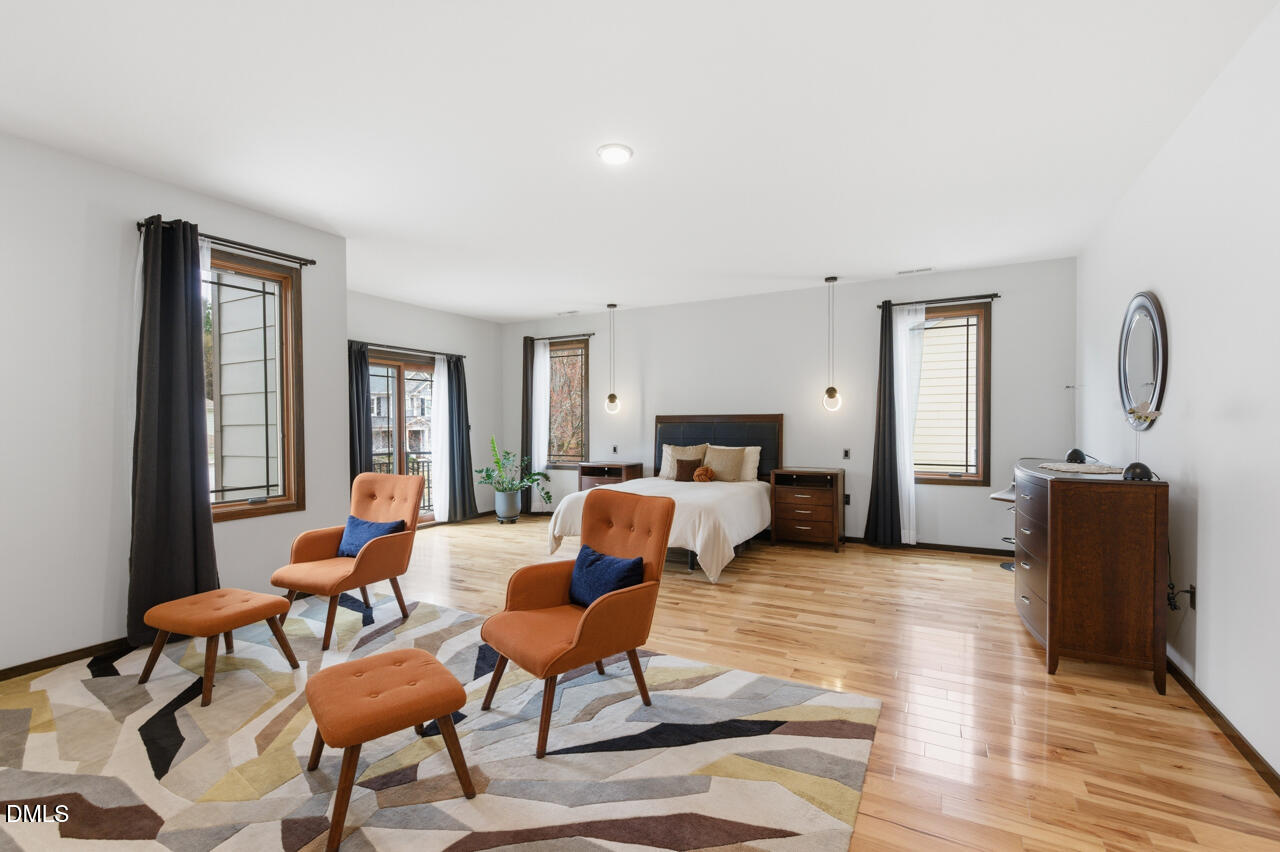 3315 Denada Path Durham, NC 27707 - Photo 42 of 74 a living room with furniture a rug and a window