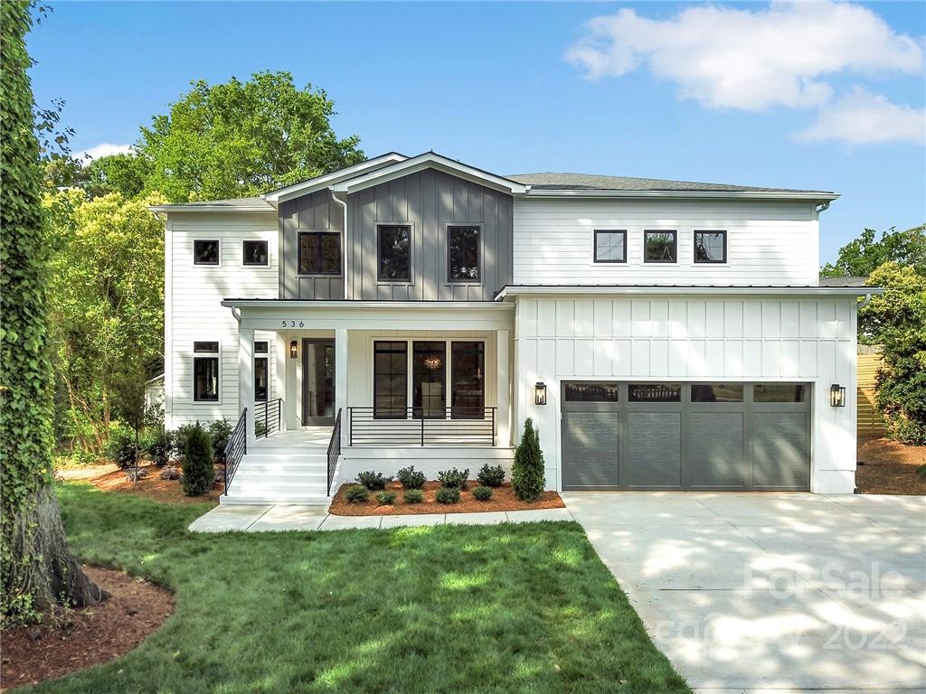 536 Marsh Road Charlotte, NC 28209 - Photo 1 of 41 a front view of a house with a yard