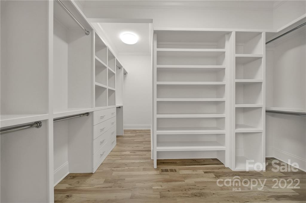 536 Marsh Road Charlotte, NC 28209 - Photo 23 of 41 a view of walk in closet with empty racks