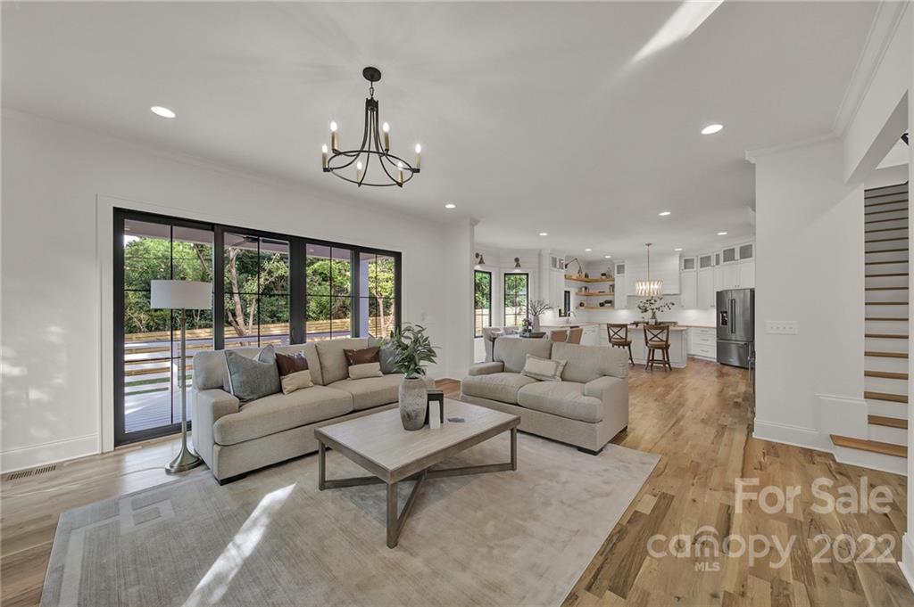 536 Marsh Road Charlotte, NC 28209 - Photo 10 of 41 a living room with furniture and a large window