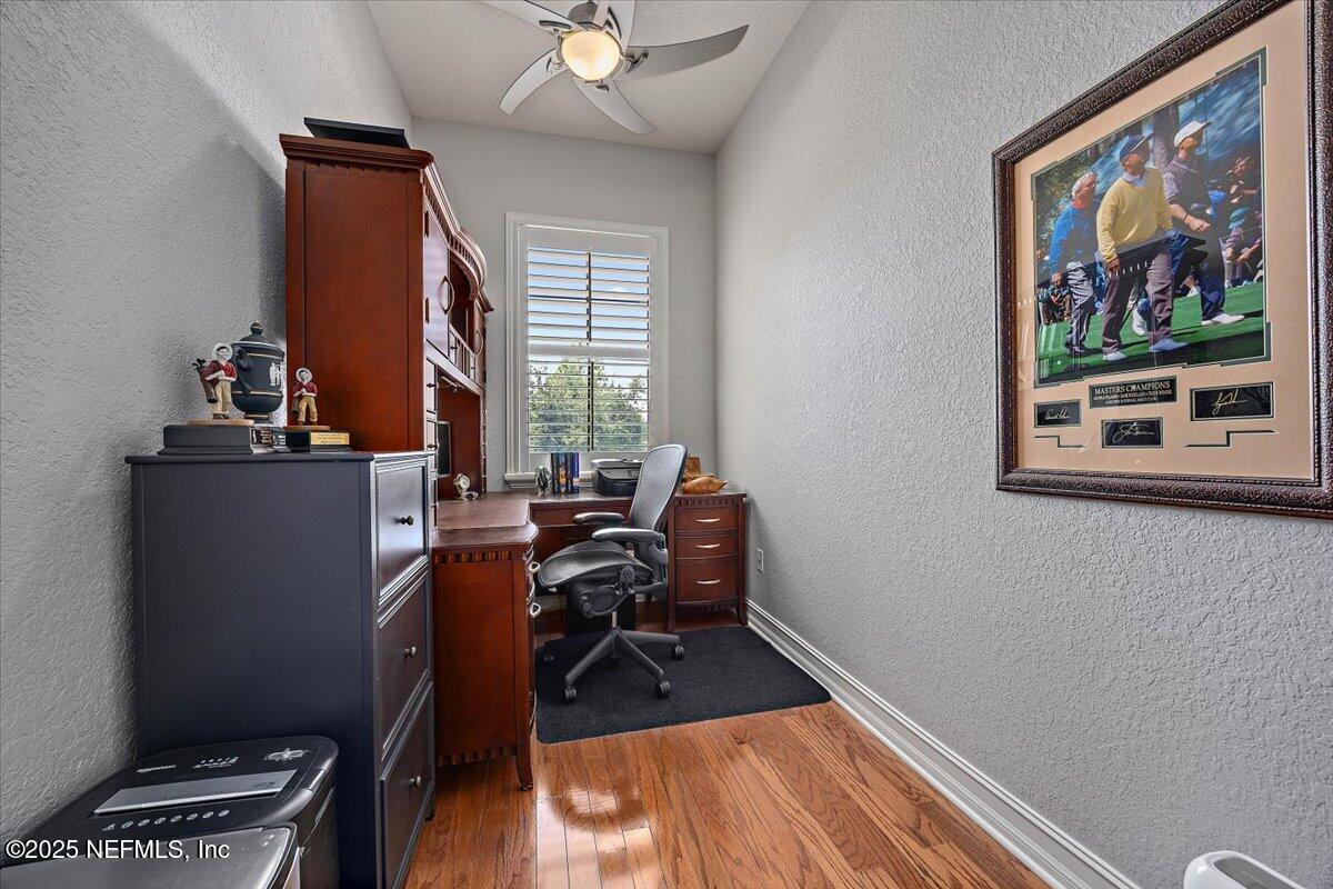 174 Laterra Links Circle, Unit 201 St. Augustine, FL 32092 - Photo 29 of 41 a view of a workspace with furniture and a window